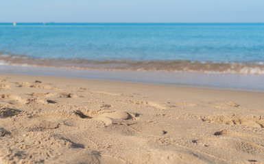 Tropical sea beach with sand and wave of the sea