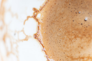 Coffee stains on the white coffee.