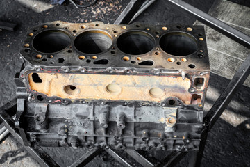 Large truck coats at the engine repair shop.