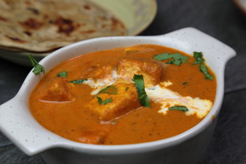 Paneer Butter Masala , a rich and creamy Indian dish made of Paneer or Tofu in tomato and cream gravy.