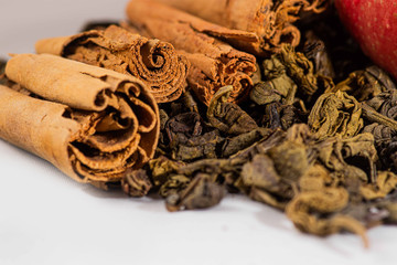 Cinnamon stick with ceylon green tea leaves - sri lankan green tea - gun powder