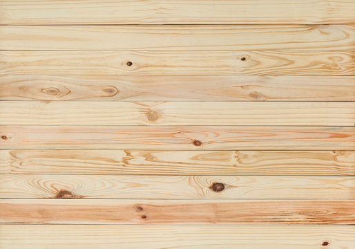 Empty difference brown shade colored of planks wooden board background. Beautiful mixed texture and pattern panels from reused old wood pallet. Image for natural material or mock up display concept.