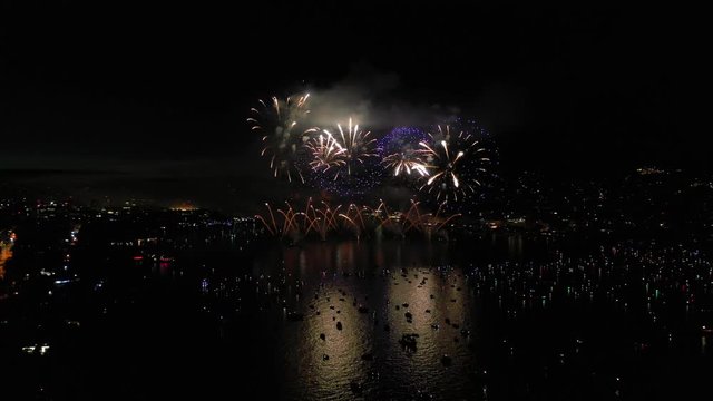 summer night zurich city famous lake fireworks show aerial panorama 4k switzerland