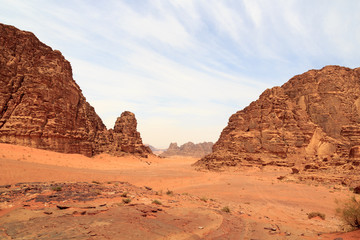 Fototapeta na wymiar Wadi Rum desert panorama with dunes, mountains and sand that looks like planet Mars surface, Jordan