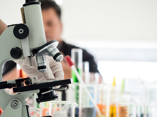 Labrotory Scientists are experimenting with red blue green and yellow medicine tubes using antimicrobial drugs germs,cancer ,colona,corona,pm2.5,H5N1 dust heart disease and blood pressure at asia