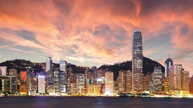 Victoria Harbor of Hong Kong city - Time lapse at sunset