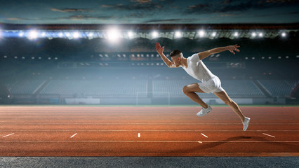 Sportsman running track. Mixed media