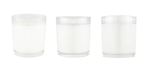 Three white candles in transparent glass isolated, mock up for branding identity of product, advertising, presentation, design of packing.