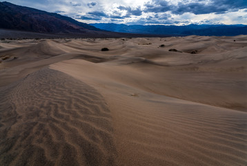 Sand Dunes and Moody Sky - Death Valley