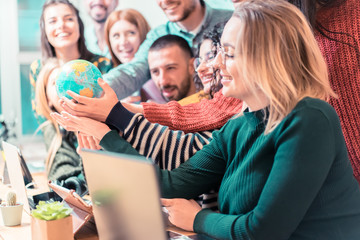 Friends celebrating the next travel experience. Happy Young Friends with the world in their hands. Travel and friendship concept – Image