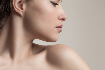 natural beauty concept young woman  profile  face closeup studio shot - 321204575