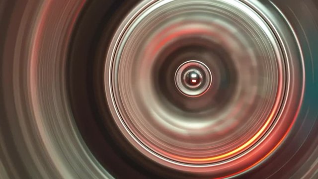 Stainless steel washing machine drum turning spin cycle, futuristic industrial look of modern machinery with colorful lighting circles