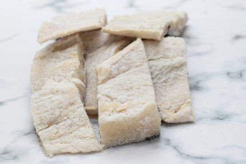 salted dry cod fish on gray backgrpound