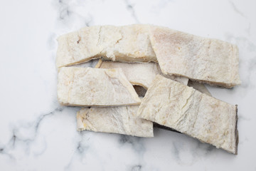 salted dry cod fish on gray backgrpound