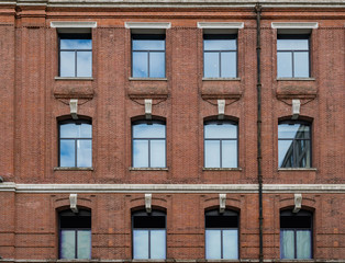 Gothic windows and brick walls