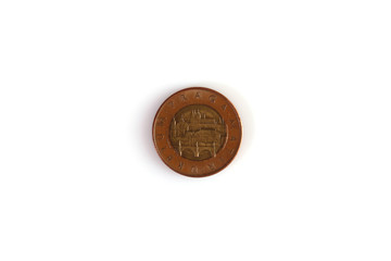 Numismatics. Old coin on a white background