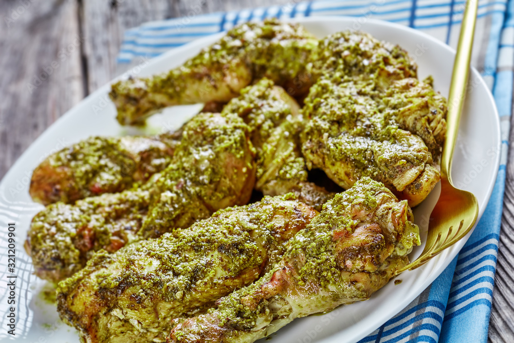 Canvas Prints close-up of juicy pesto chicken on a plate