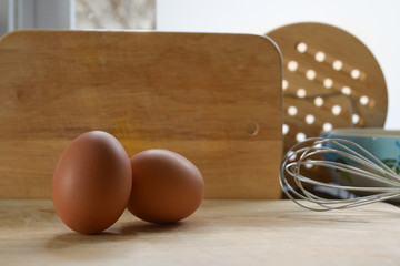 hen egg put on wood cutting board in kitchen prepare cooking