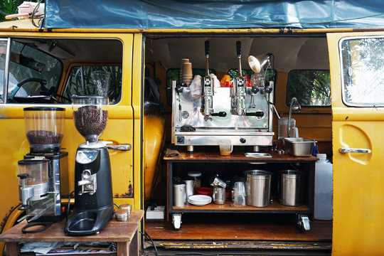 Exterior design and decoration of local coffee cafe decorated with Yellow van car