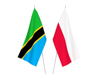 National fabric flags of Tanzania and Poland isolated on white background. 3d rendering illustration.