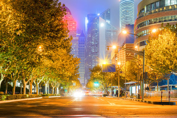 At night, city roads and skyscrapers in Shanghai, China