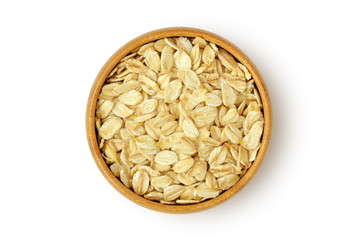 Oat flakes in wooden bowl on white background