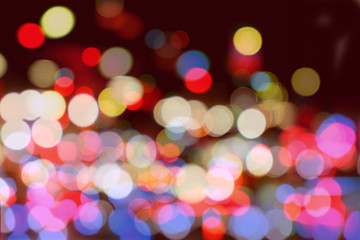 Abstract colorful bokeh and blurred reflection lighting on black background.