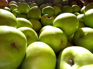 green apples on black background