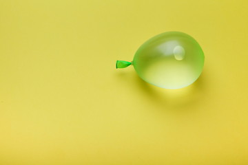 water balloon on yellow background