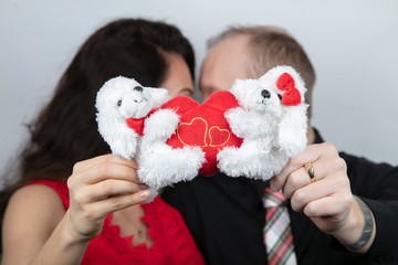 man and woman kiss each other. Valentine's day congratulation concept