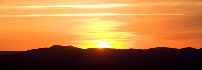 Bright sunset in the mountains, natural backgrounds