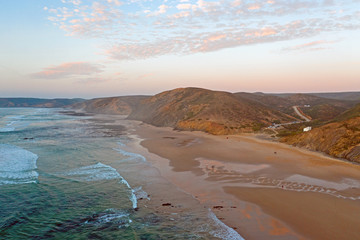Aerial from Praia Vale Figueiras in Portugal at sunset