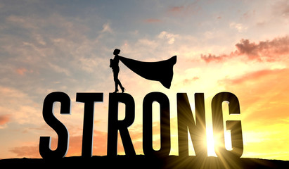 Silhouette of superhero woman stood on the word strong. 3D Rendering