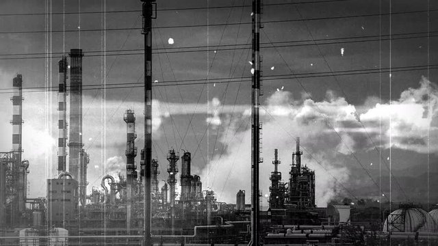 Vintage film showing factory with glitches and scratches.