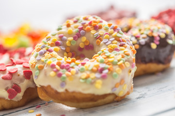 Sweet glazed donuts on table - Close up