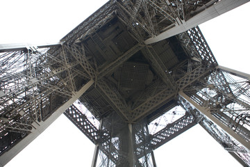 The iron construction of the Eiffel Tower. View from below. Paris.
