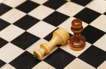 pawn winning queen in a chess game