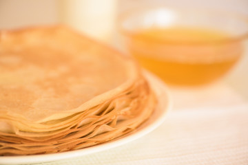 Maslenitsa is a national holiday at the end of February . pancakes are fried for a week with honey...