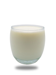Hot milk in a glass on white background. (clipping path)