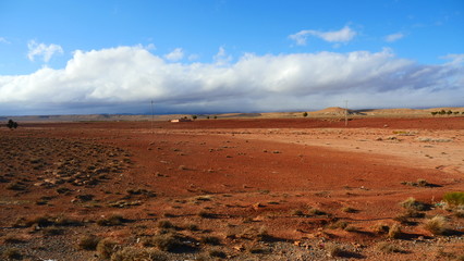 Bright landscape of Morocco, breathtaking curves of mountains, stunning combination of hills & farm land,inadvertent distribution of houses & huts, raw impression of pure nature.