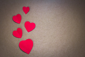 Red heart top view decoration Valentine's day  Love on brown background