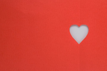 Love heart on red background