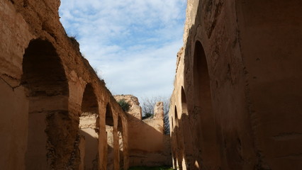 Bright landscape of Morocco, breathtaking curves of mountains, stunning combination of hills & farm land,inadvertent distribution of houses & huts, raw impression of pure nature.