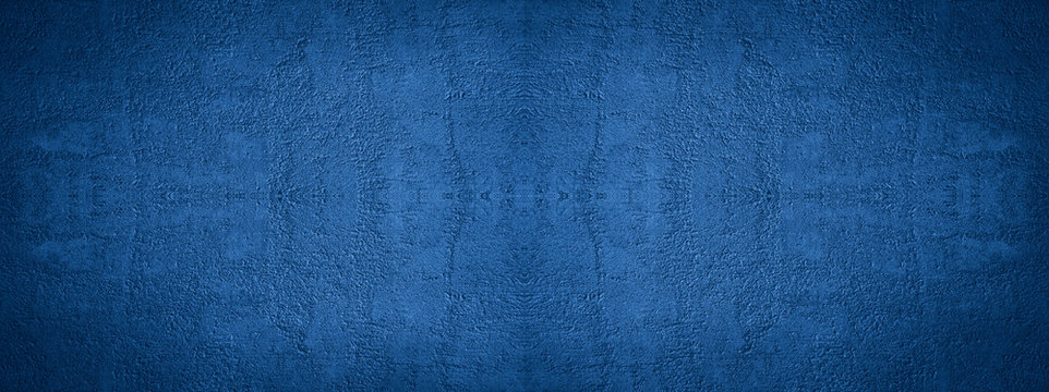 Blue elegant background. Toned texture of decorative plaster on a concrete wall. Close-up. Beautiful vintage background. Blue wide banner with copy space for your design.