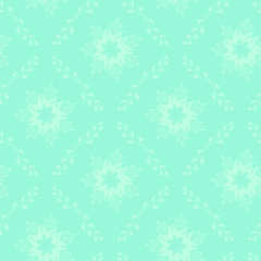 Fototapeta premium Vector seamless background, symmetrical light snowflake mandala and leaves pattern on light blue backdrop. Beautyful retro tile for wrapping and decoration in old wallpapers style.