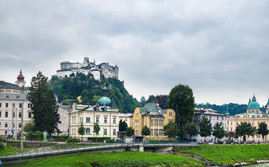 Fototapeta na wymiar Beautiful view of Salzburg skyline with Festung Hohensalzburg and Salzach river in Salzburg, Austria