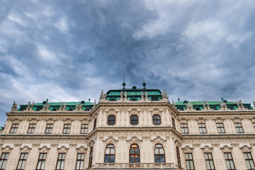 Fragment of facade of Belvedere Palace, located in the center of Vienna, Austria. Royal palace under blue cloudy sky
