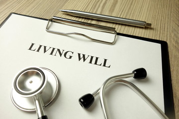 Living will directive with stethoscope and pen