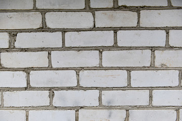 Brickwork of an old wall. White background for design.