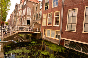 Delft, the netherlands, august 2019. The pretty and romantic canals, smaller than in Amsterdam. The...